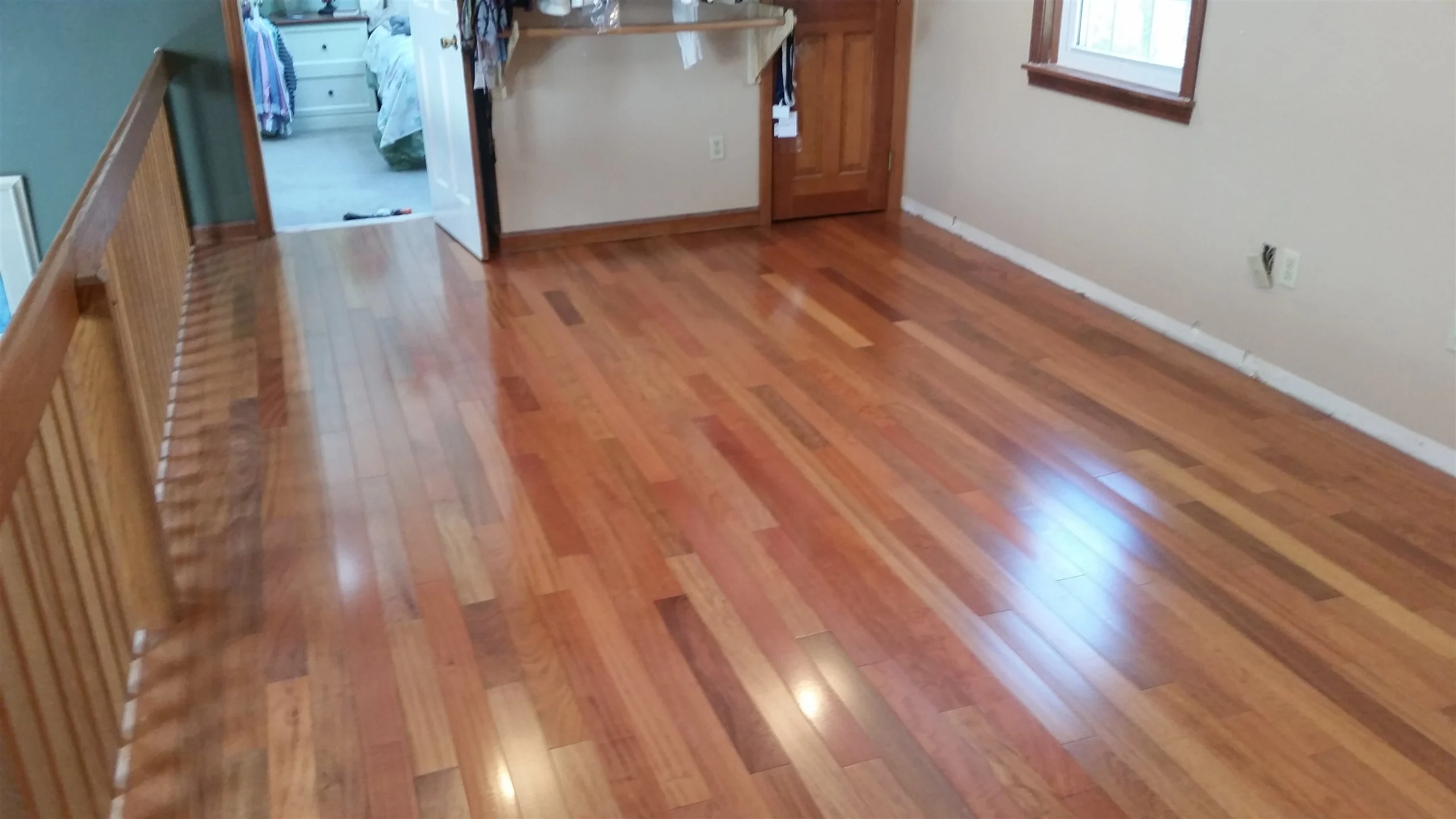 Hardwood floor installation in a bright room