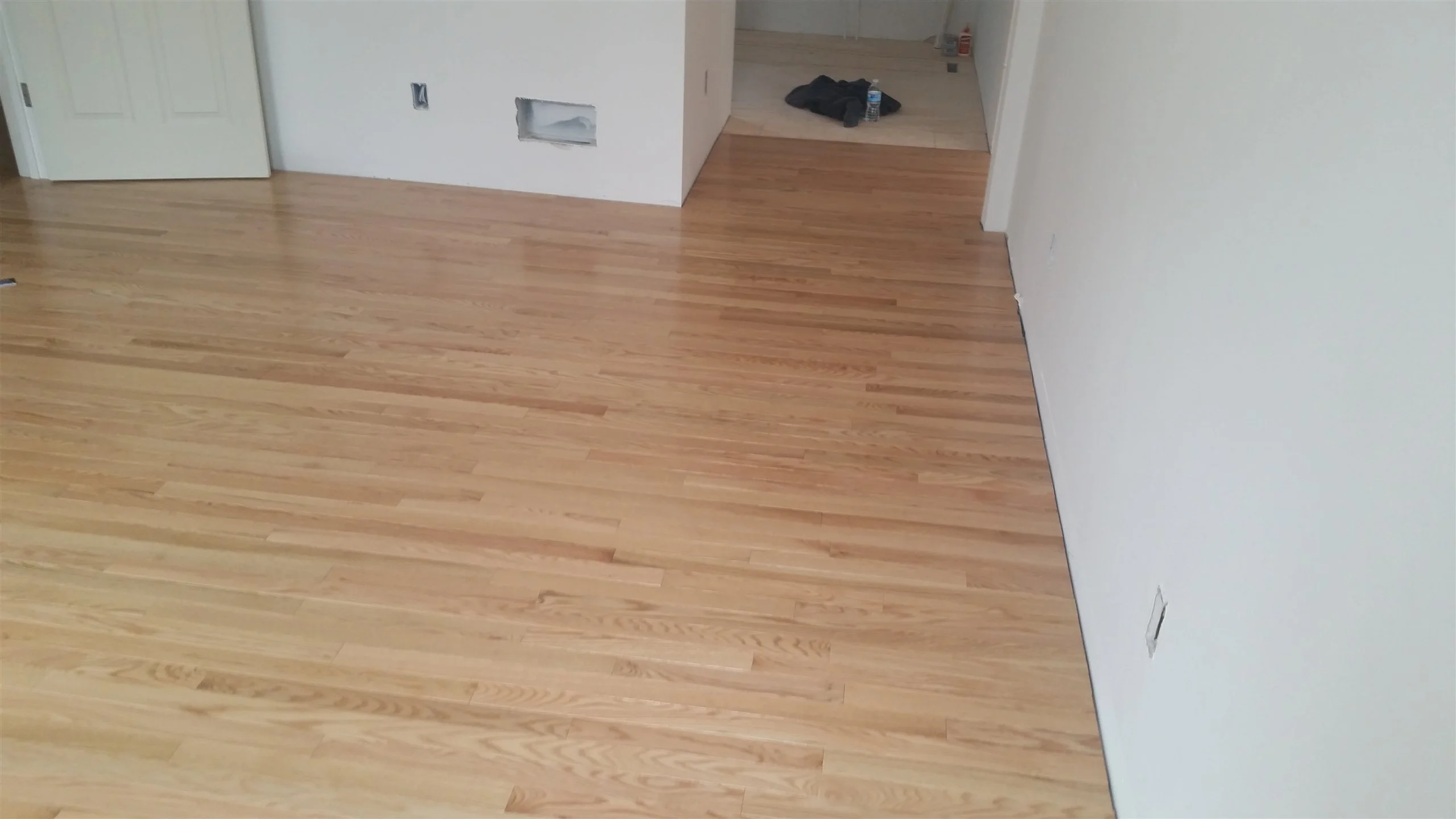 Hardwood floor and stair installation by All About Flooring, Derry NH