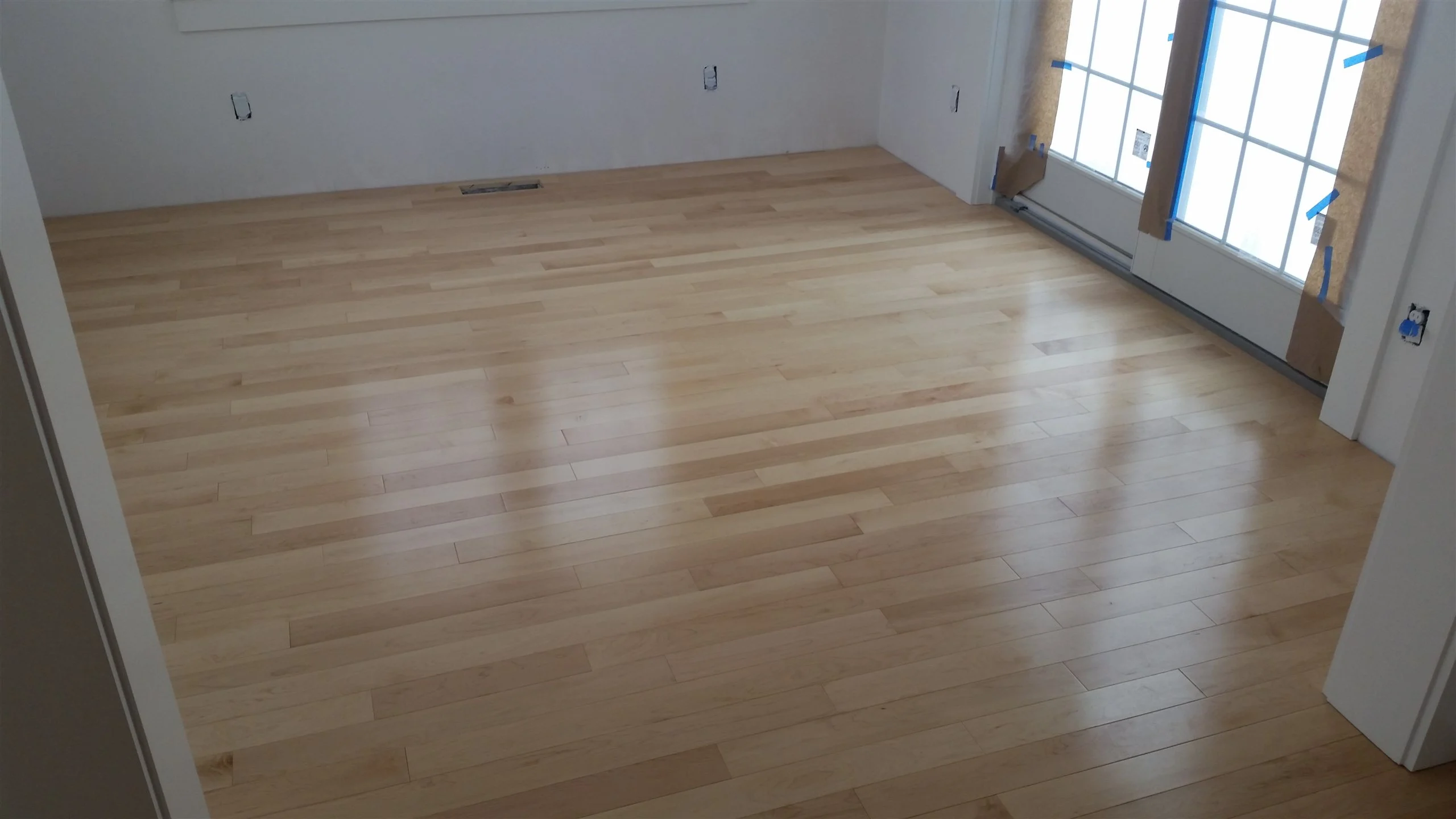 Hardwood floor and stair installation by All About Flooring, Derry NH