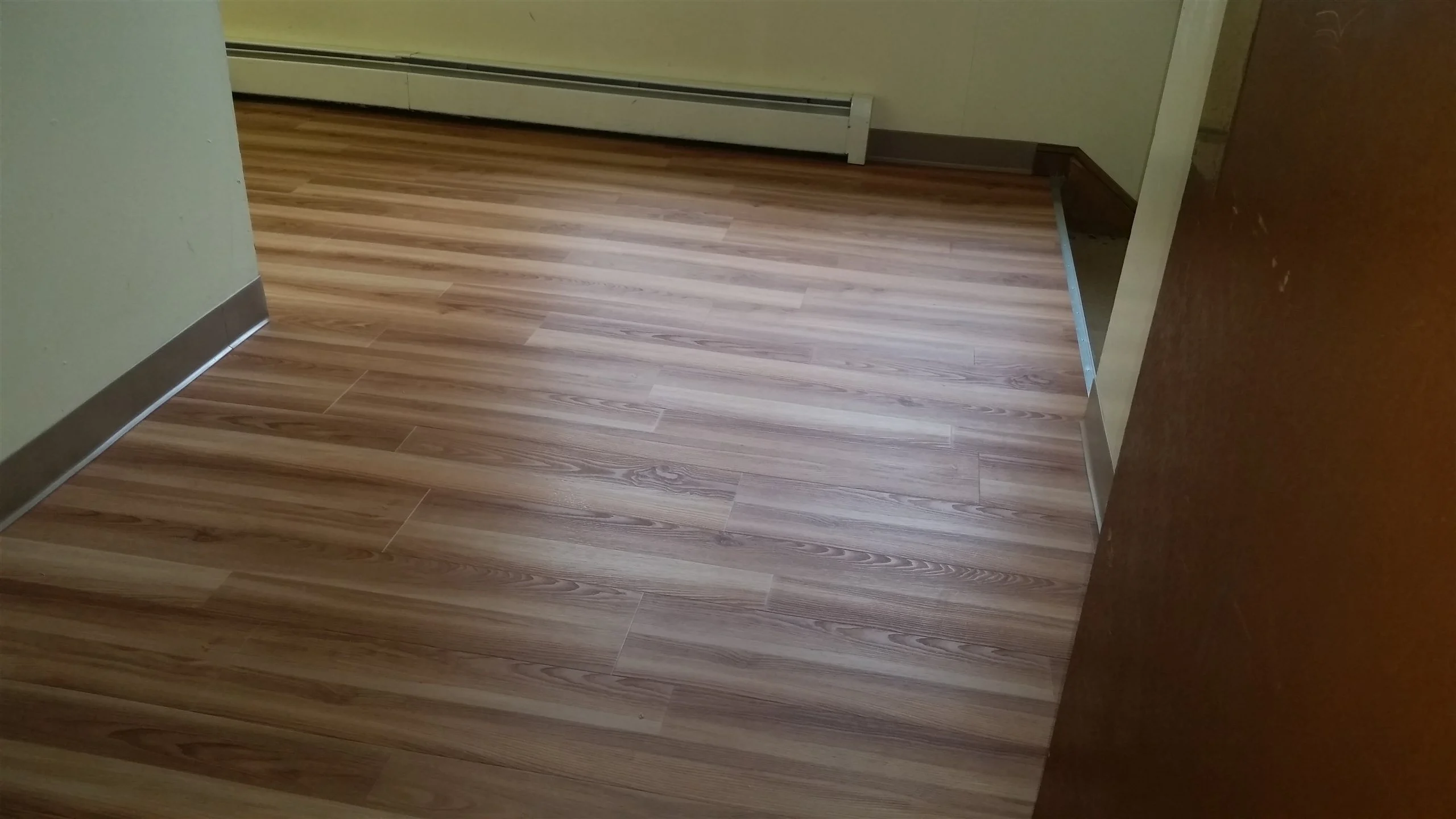 Hardwood floor and stair installation by All About Flooring, Derry NH