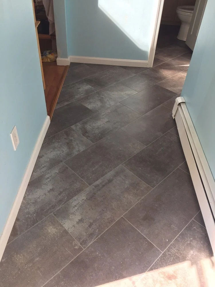 Luxury vinyl tile flooring in a hallway