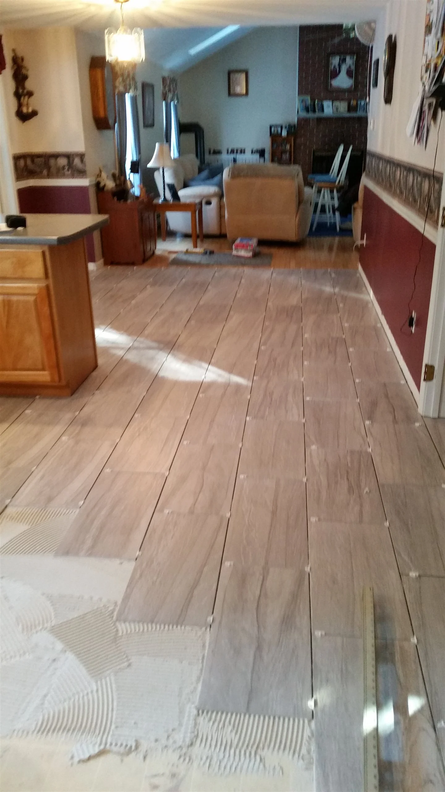 Tile floor and wall installation by All About Flooring, Derry NH