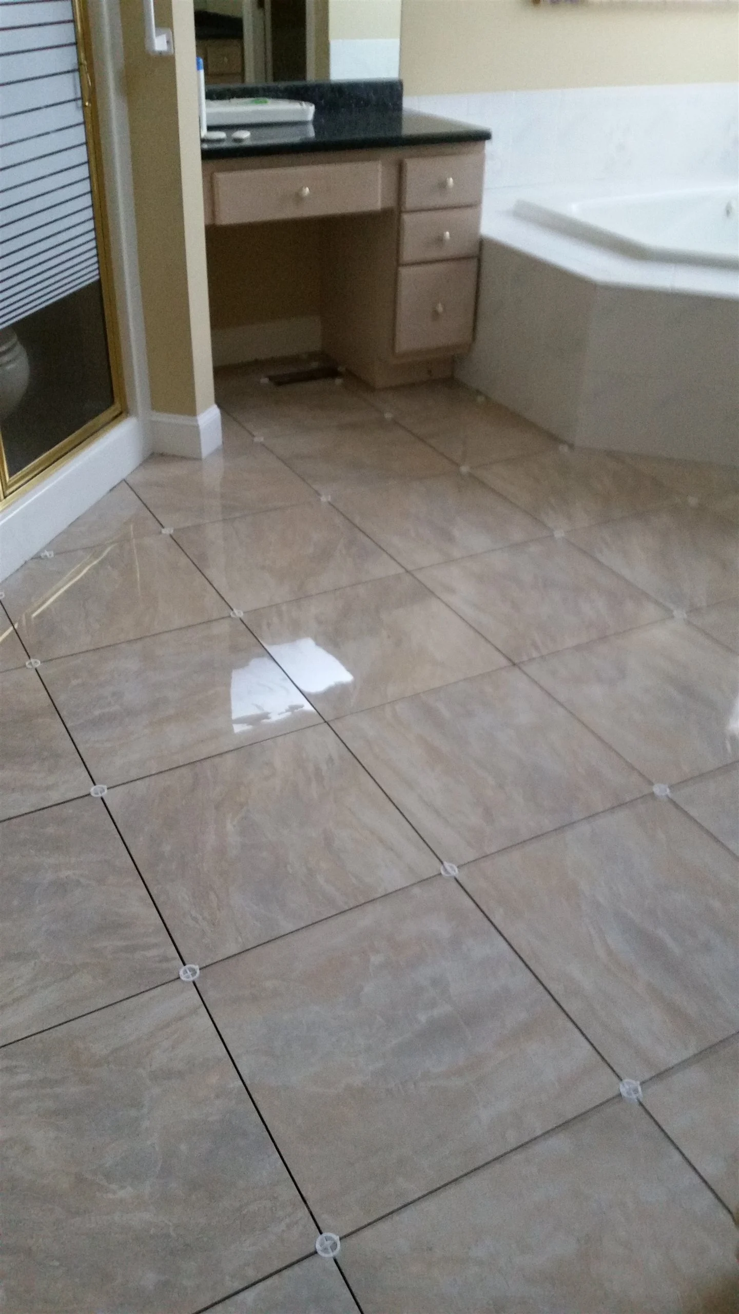 Tile floor and wall installation by All About Flooring, Derry NH