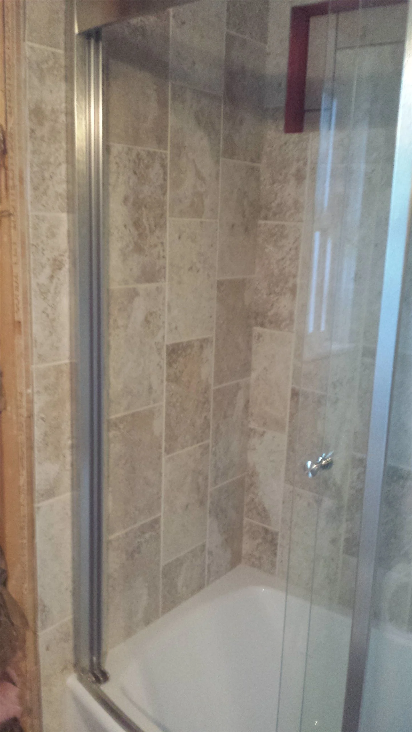 Tile floor and wall installation by All About Flooring, Derry NH