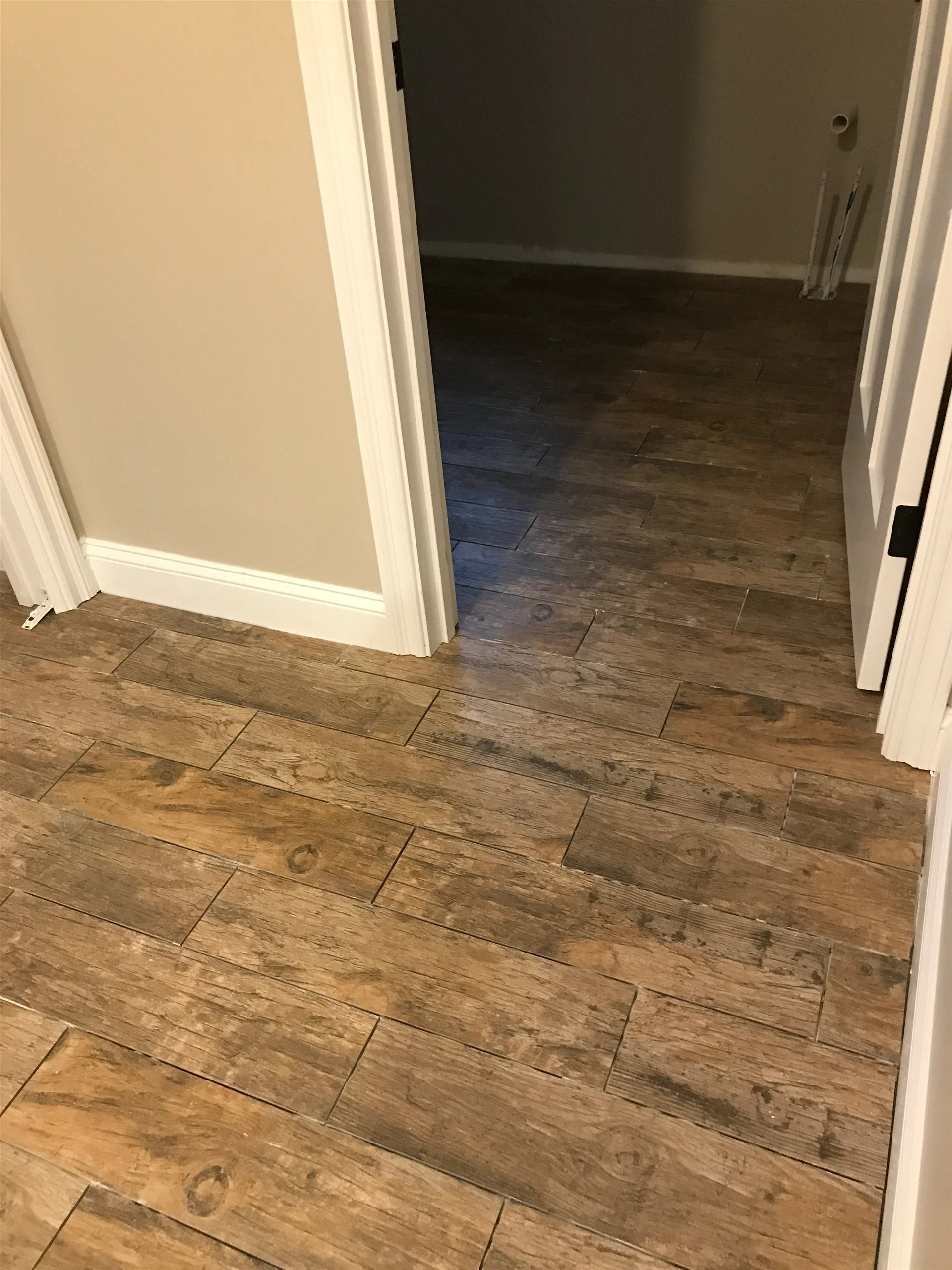 Tile floor and wall installation by All About Flooring, Derry NH