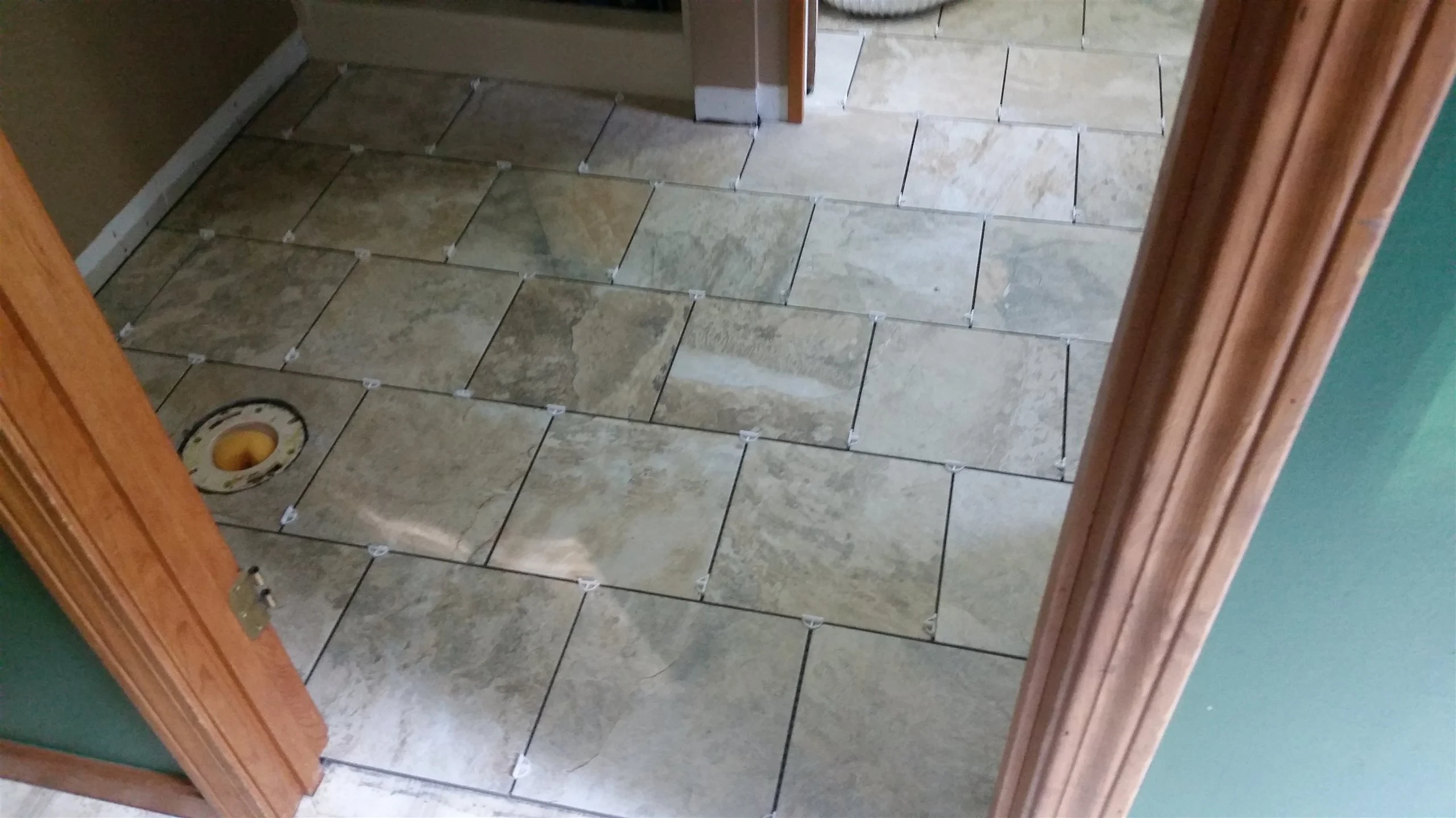 Tile floor and wall installation by All About Flooring, Derry NH