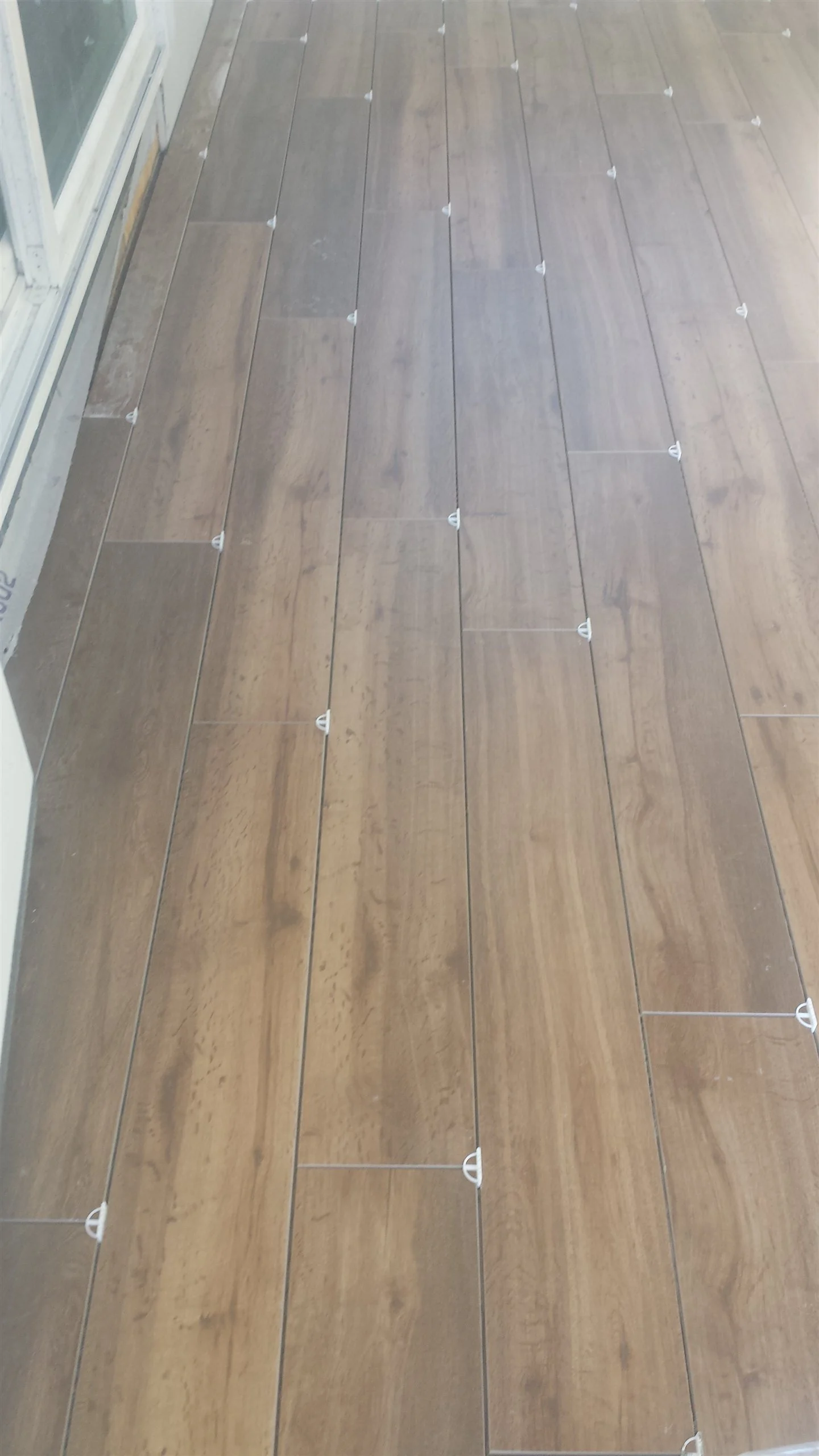 Tile floor and wall installation by All About Flooring, Derry NH