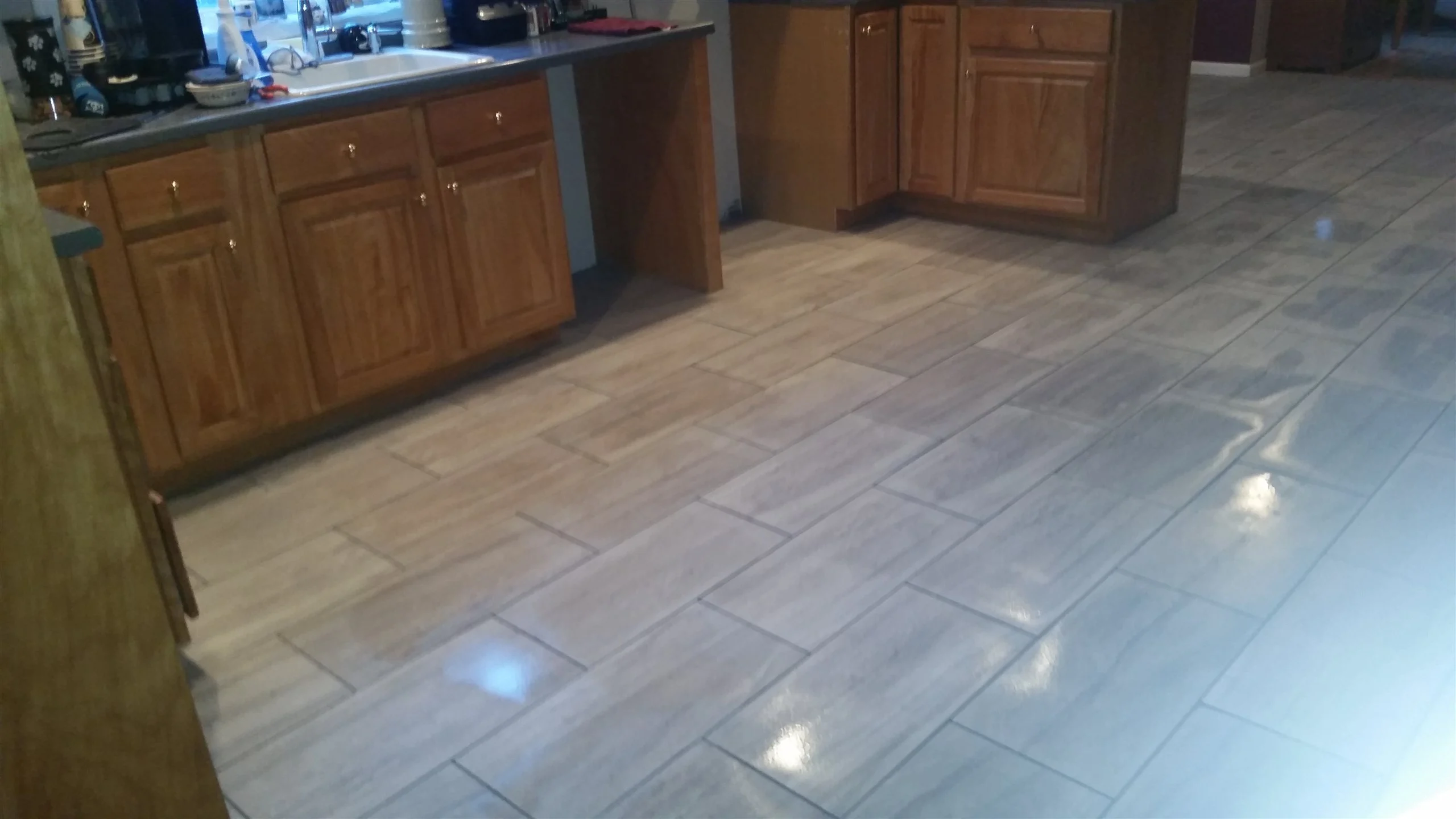 Tile floor and wall installation by All About Flooring, Derry NH