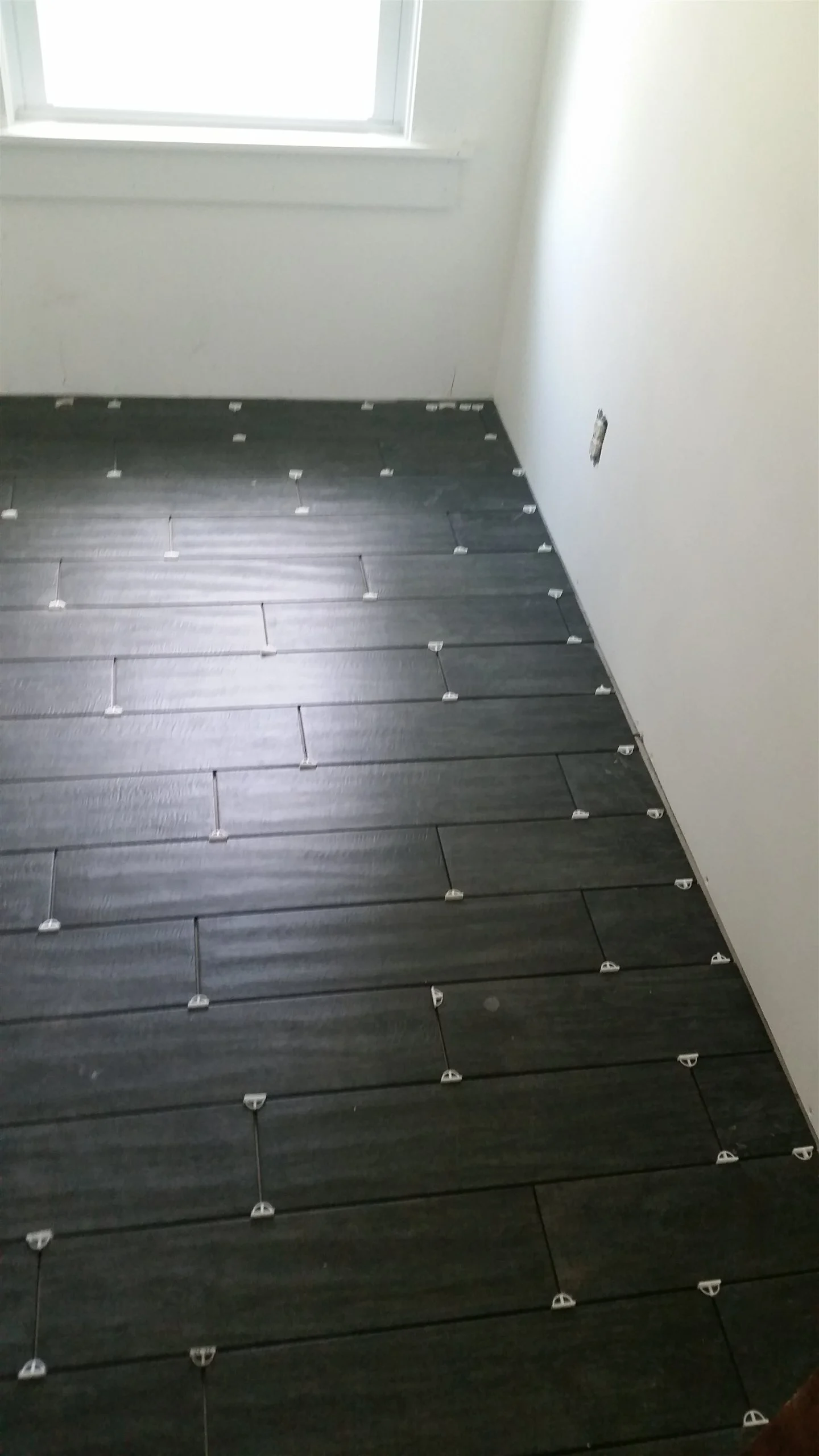 Tile floor and wall installation by All About Flooring, Derry NH