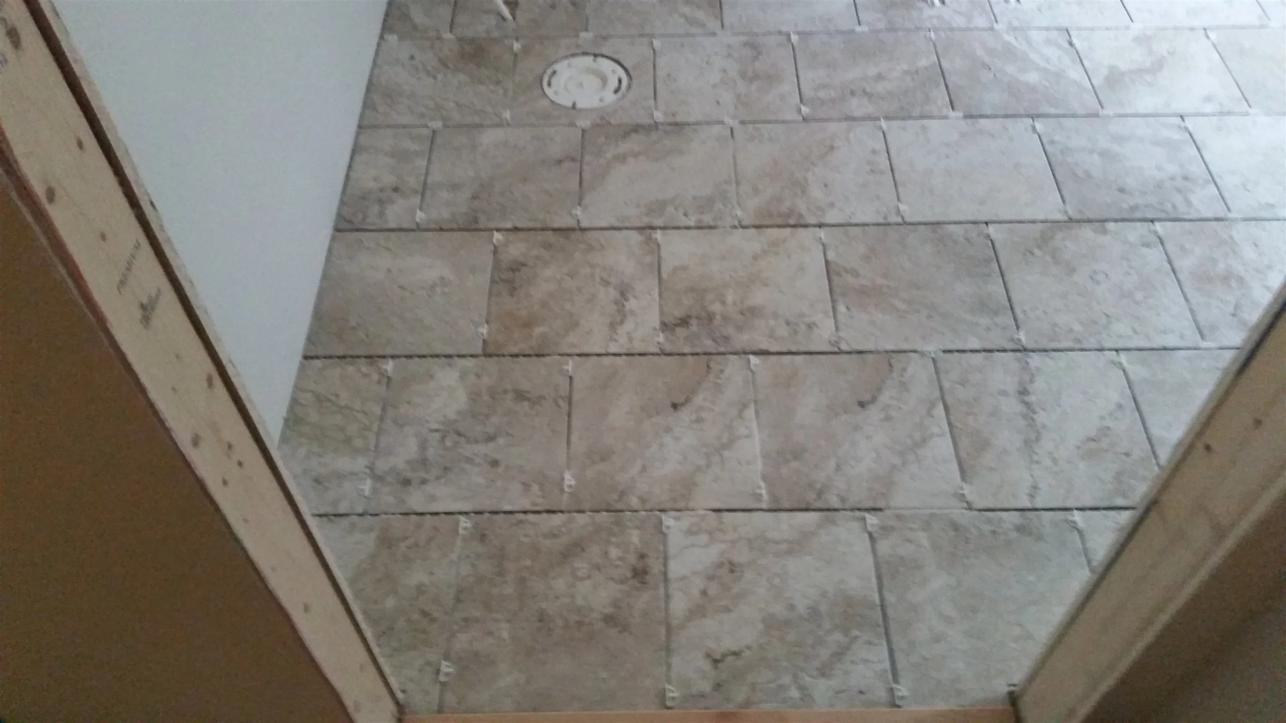 Tile floor and wall installation by All About Flooring, Derry NH