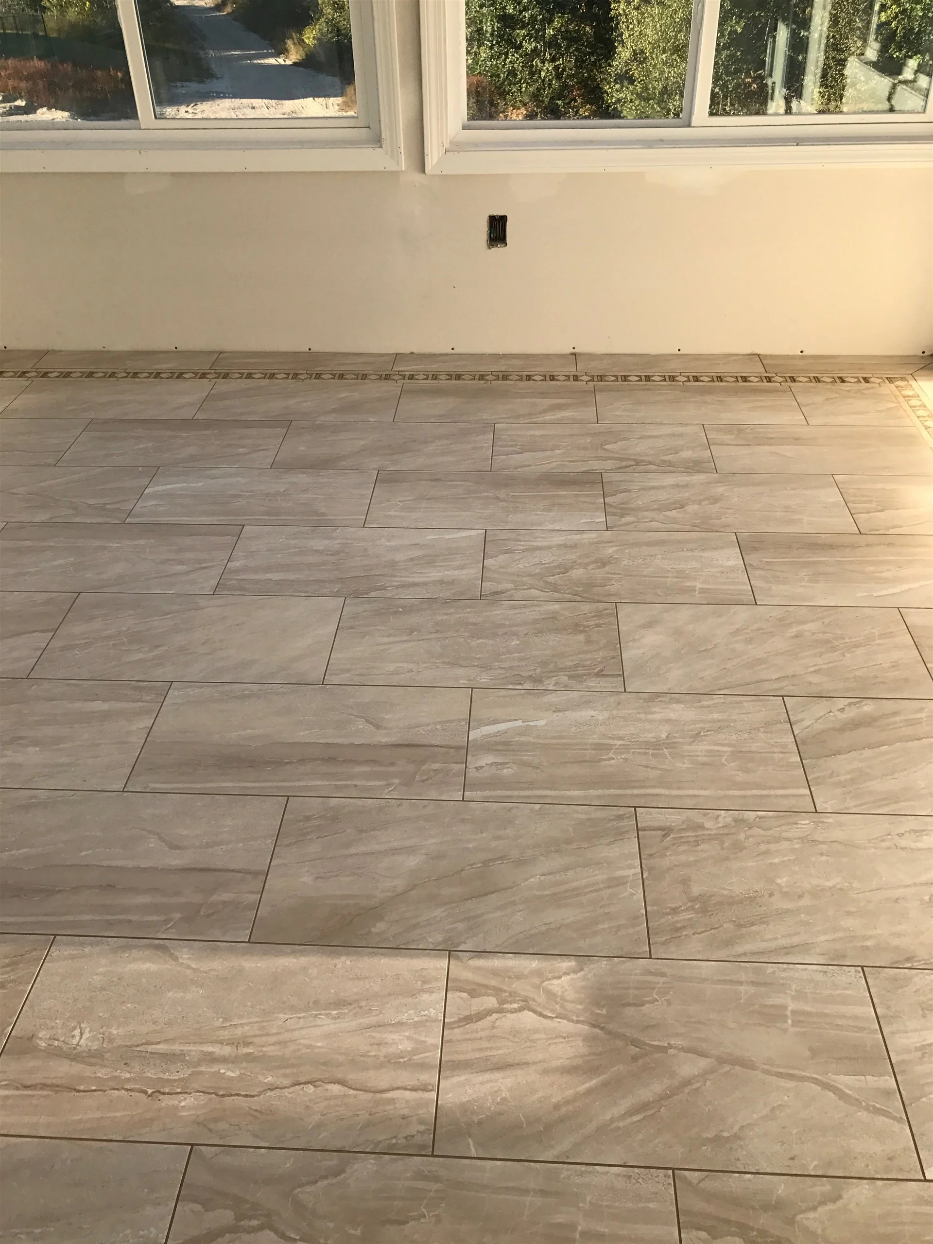 Tile floor and wall installation by All About Flooring, Derry NH